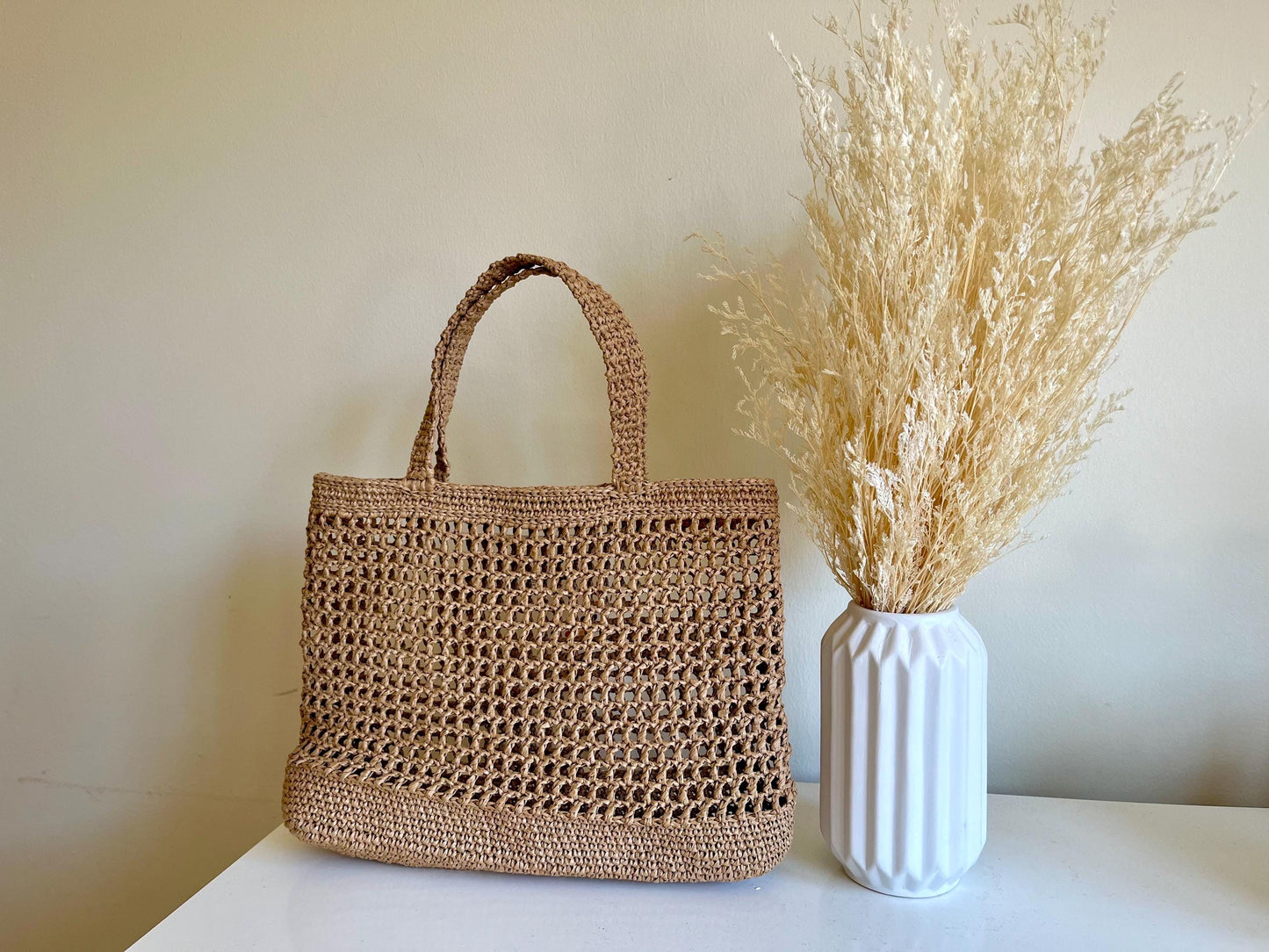 Chic raffia tote for summer beach holiday