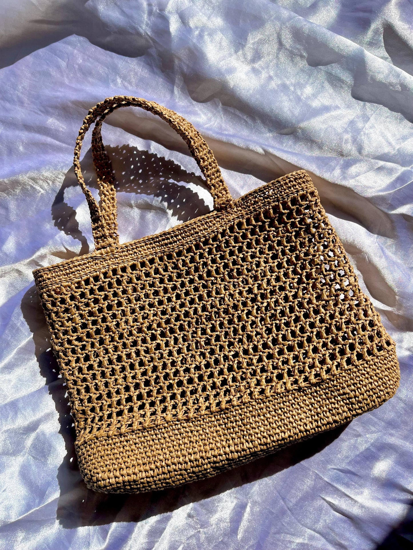 Chic raffia tote for summer beach holiday