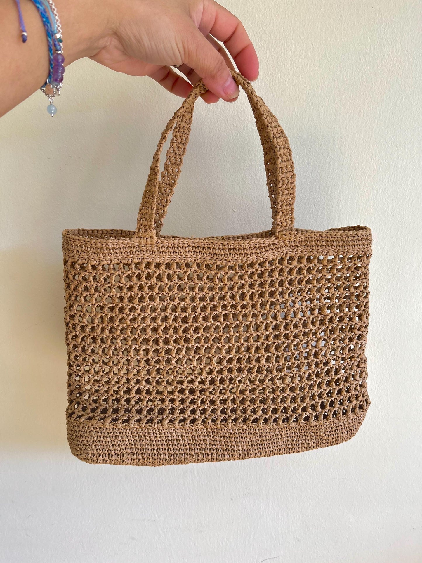Chic raffia tote for summer beach holiday