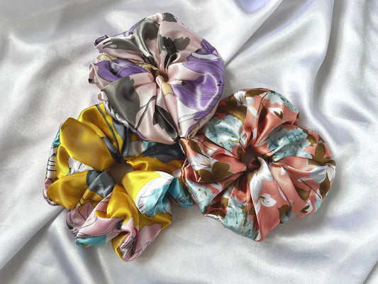 XL Scrunchies in delightful spring floral patterns satin fabrics. Silk scrunchies, giant scrunchies, oversized scrunchies, jumbo scrunchies.