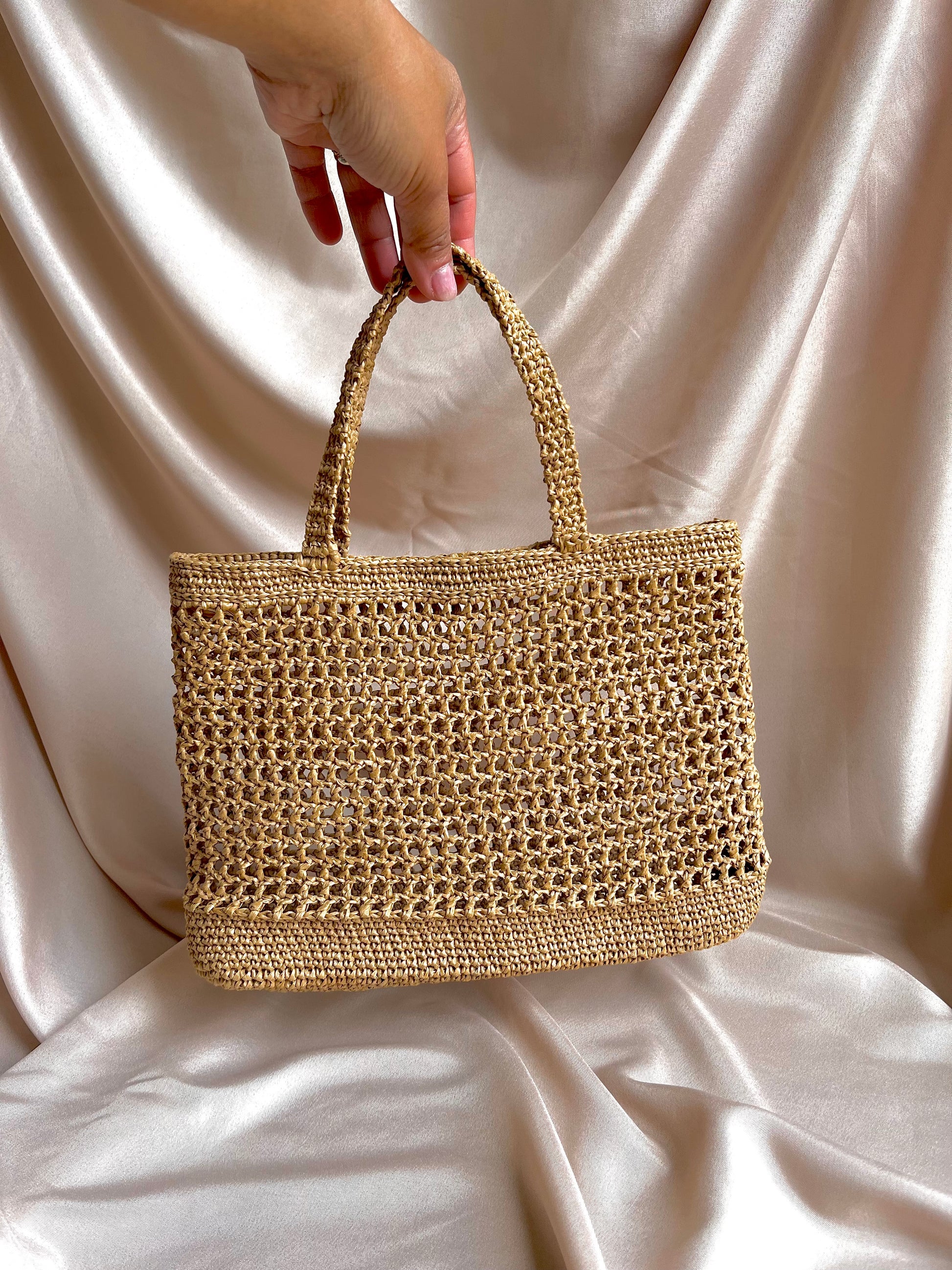 Chic raffia tote for summer beach holiday