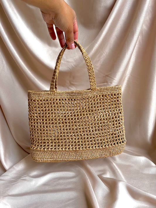 Chic raffia tote for summer beach holiday