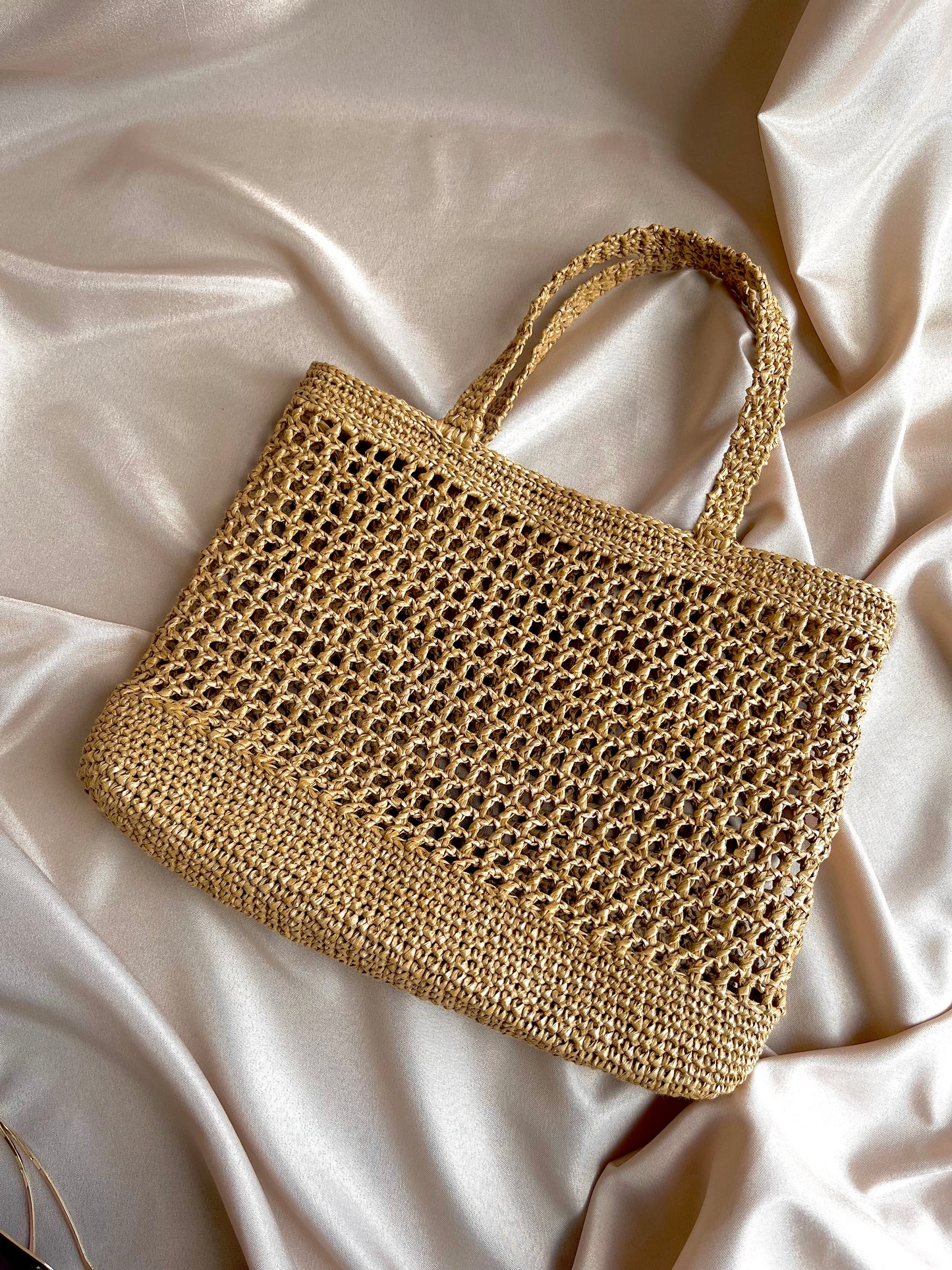 Chic raffia tote for summer beach holiday