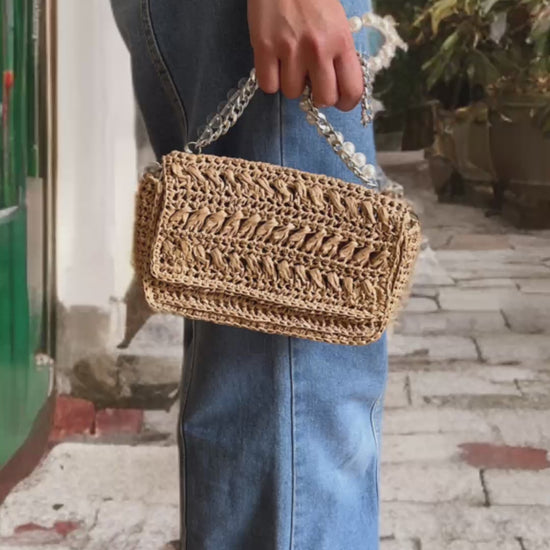 Chic pearl and chain strap raffia shoulder bag